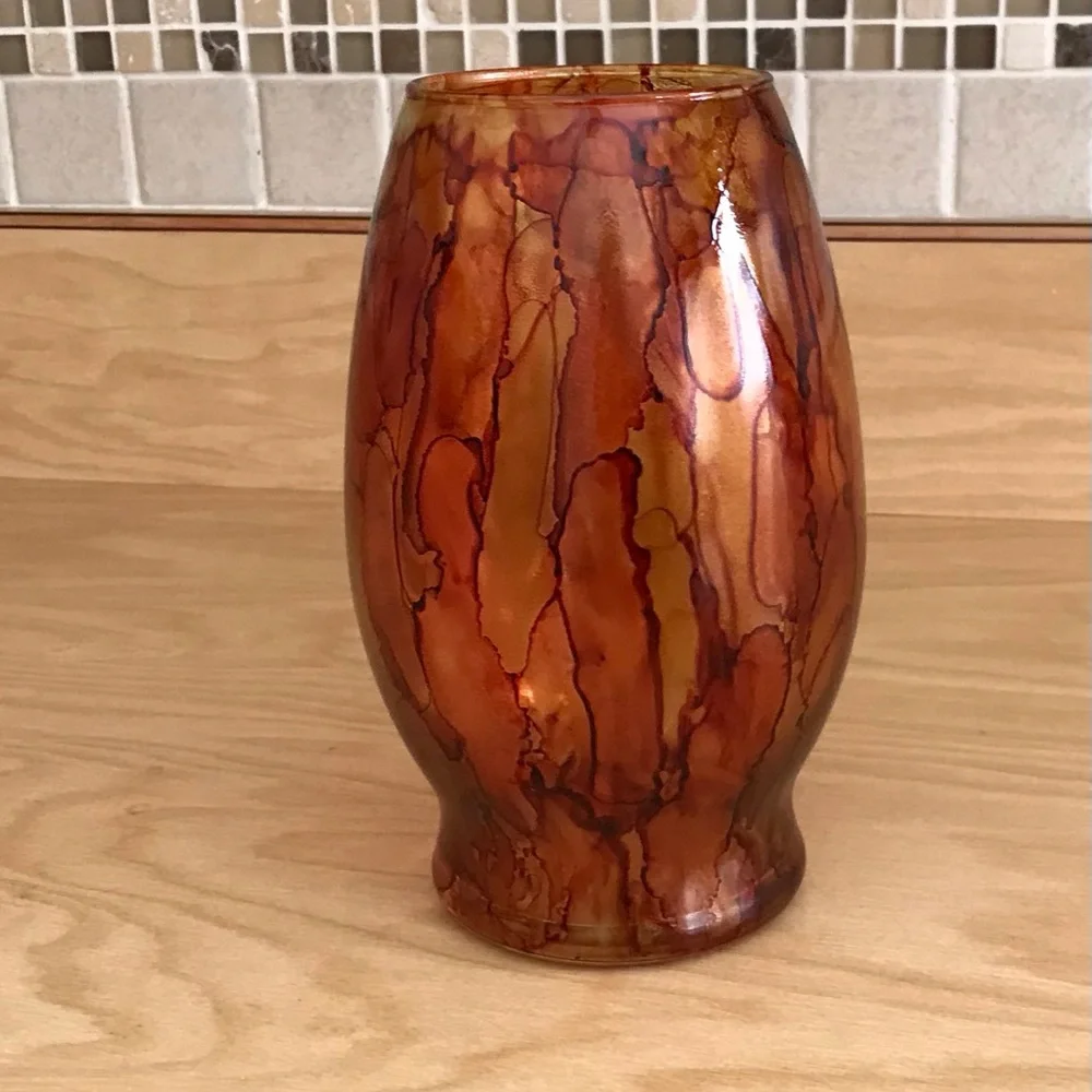 Hand crafted brown orange artisan glass vase painted with alcohol inks